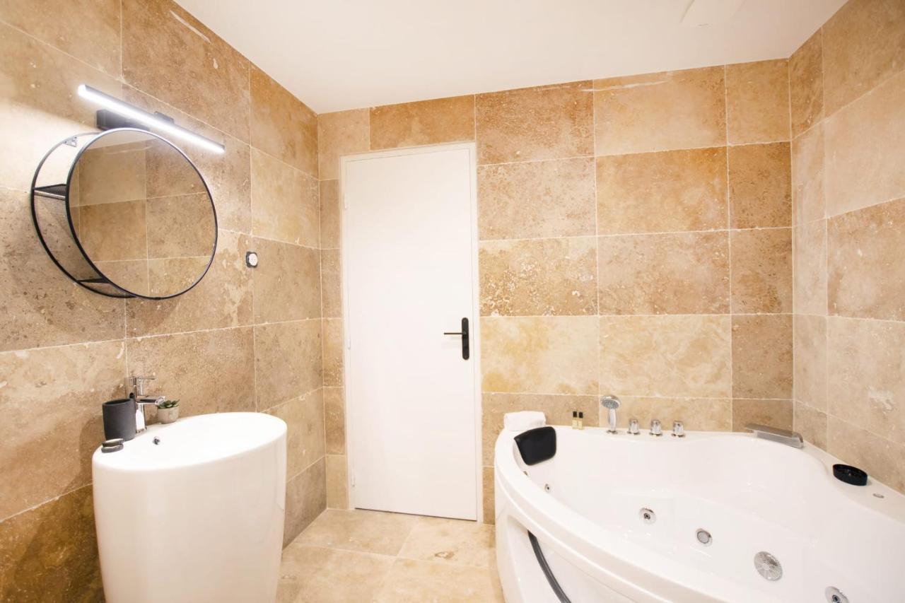 Guestready - Studio With Jacuzzi In The 10 Th Apartamento Paris Exterior foto